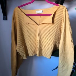 Cropped long sleeve yellow top